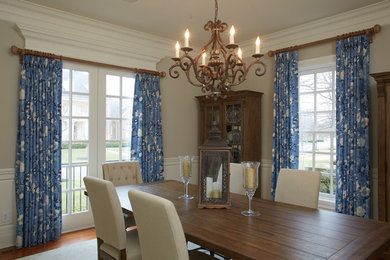 Large traditional separate dining room in Columbus with beige walls, dark hardwood floors and no fireplace.