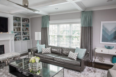 Example of a large transitional open concept dark wood floor and brown floor living room design in Boston with gray walls, a standard fireplace, a stone fireplace and a wall-mounted tv