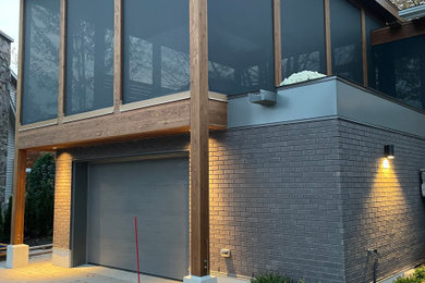 Inspiration for a large attached garage remodel in Montreal