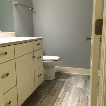 Urbandale basement with built in cabinets.