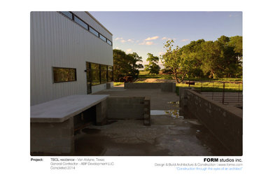 Example of a minimalist exterior home design in Dallas