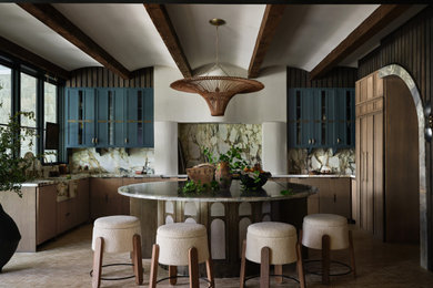 Kitchen - transitional l-shaped beige floor, exposed beam and vaulted ceiling kitchen idea in Dallas with a farmhouse sink, shaker cabinets, blue cabinets, multicolored backsplash, stone slab backsplash, paneled appliances, an island and multicolored countertops