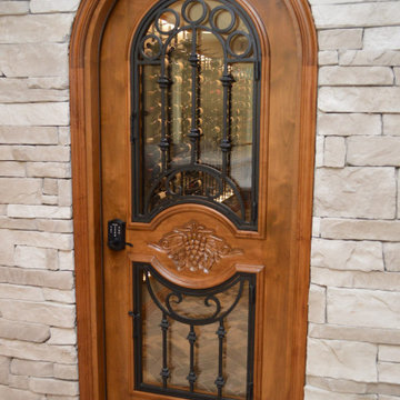 Beautiful Wine Cellar Door that Leads to the Contemporary Home Wine Cellar