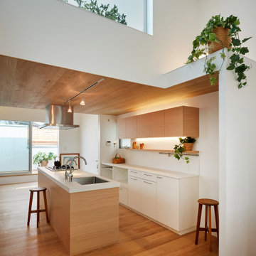 キッチンに家族が集まる家-大口の家