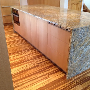 Microwave/ speed oven concealed behind island.