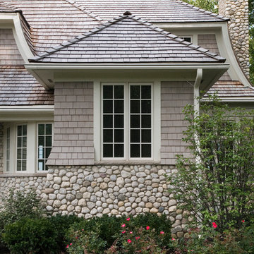 Cape Cod Shingle Style House with Stone Watertable and Cedar Shake Roof
