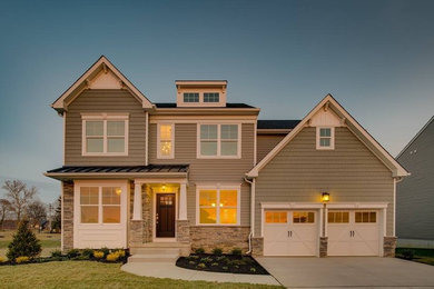 Craftsman green two-story house exterior idea in Philadelphia