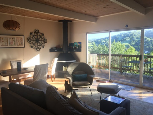 Lighting In Mid Century Living Room With Open Beam Ceiling