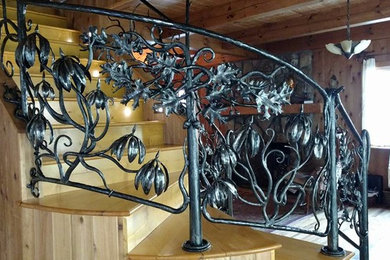 Example of a mid-sized mountain style staircase design in Atlanta
