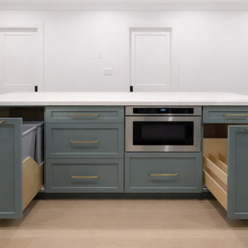 Custom Green Kitchen Cabinets with Panel-Ready Appliances and Designer Collabora