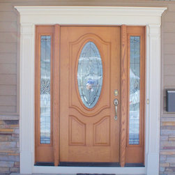 Wood Grain Front Door with Oval Window & Decorative White Trim - Front Doors