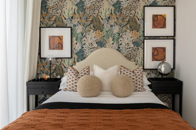 This is an example of a large traditional bedroom in London.