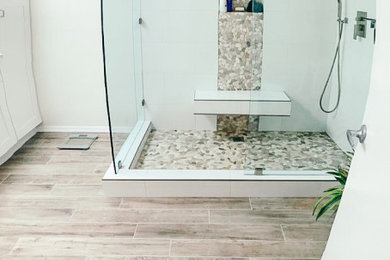 Inspiration for a large scandinavian master ceramic tile and beige floor bathroom remodel in Los Angeles with shaker cabinets, white cabinets, quartzite countertops, beige countertops, a bidet, white walls and a drop-in sink