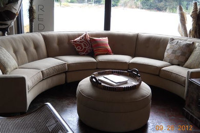 Example of a medium tone wood floor living room design in San Francisco with beige walls