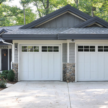 Lodge Look Makeover with Master Bedroom and Garage Addition in Wooded Setting