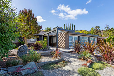 Mid-sized contemporary multicolored one-story mixed siding house exterior idea in San Francisco with a hip roof and a shingle roof