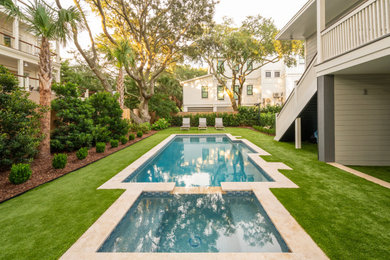 Beach style pool photo in Charleston