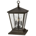 Hinkley - Trellis 4-Light Outdoor Light In Regency Bronze - Trellis is a traditional European lantern design in an Aged Zinc finish with clear glass or Regency Bronze with clear seedy glass. The cast loop finial and true rivet detail create a refined elegance.  This light requires 4 , 4W Watt Bulbs (Not Included) UL Certified.