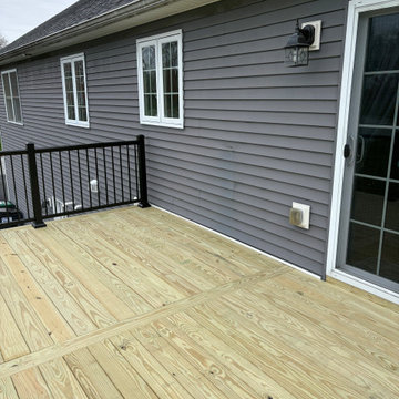 Pressure Treated Wood Deck with black powder coated rail