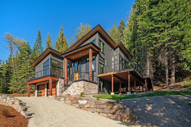 Minimalist gray two-story wood house exterior photo in Other