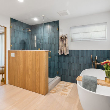 Teal zellige tile, soaking tub — 90s Fixer, Reno interior design by Find Design