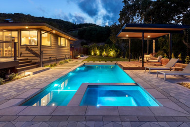 Hot tub - mid-sized modern backyard concrete paver and rectangular lap hot tub idea in San Francisco