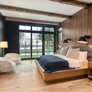 Hand Hewn Box Beams and White Oak Flooring in Rustic Modern Luxury Bedroom