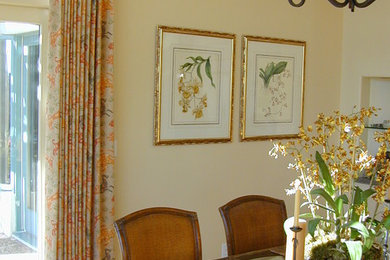 Enclosed dining room - traditional enclosed dining room idea in Santa Barbara with white walls