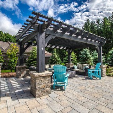 Custom curved pool with spillover hot tub - Georgetown