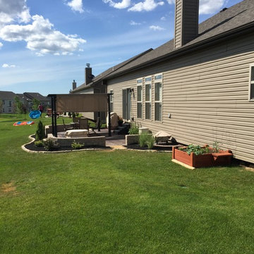 Patio pergola/custom sitting seat-walls/aptio staining/professional landscaping
