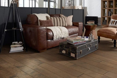 Example of a mid-sized urban formal and open concept dark wood floor living room design in Other with white walls
