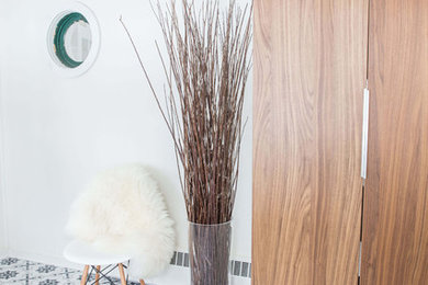 Mid-sized eclectic ceramic tile foyer photo in Other