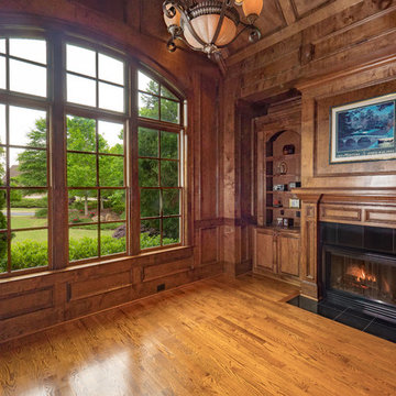 Wood Paneled Home Office with Fireplace