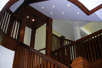 Staircase - mid-sized transitional straight staircase idea in Boston