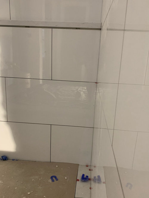 Large tile joint at shower ledge