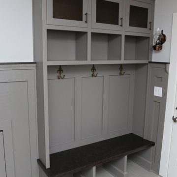 Custom Grey Mudroom Bench with Integrated Cubbies and Wall Hooks