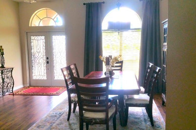 Design ideas for a transitional dining room in Tampa.