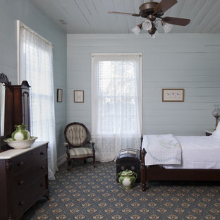 Réalisation d'une chambre avec moquette champêtre avec un mur gris et un sol bleu.