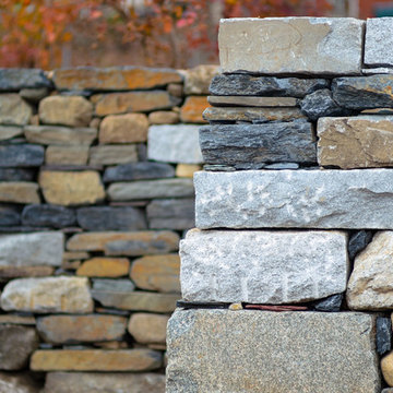 Dry laid stone wall - batter