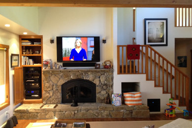 Living room - craftsman living room idea in Santa Barbara with a wall-mounted tv