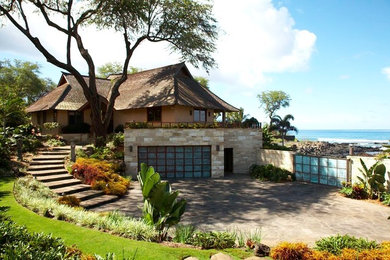 Zen two-story exterior home idea in Hawaii