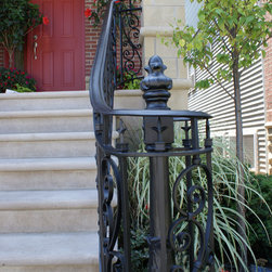 Solid stone stairs with ornamental iron railing - Products
