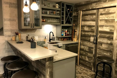 Mid-sized mountain style u-shaped brown floor seated home bar photo in Other with an undermount sink, flat-panel cabinets, dark wood cabinets, granite countertops, wood backsplash and beige countertops