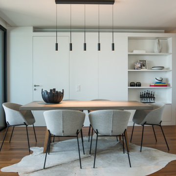 Dining Room Linear Pendants over Wooden Table