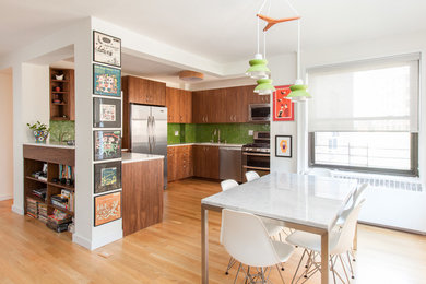 Example of a mid-sized 1950s light wood floor kitchen/dining room combo design in New York with white walls and no fireplace