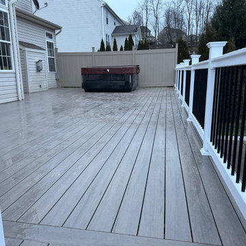Expansive Elevated Composite Deck with Two-Tone Railing
