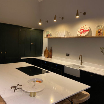 Large handmade kitchen with kitchen island and full length larder