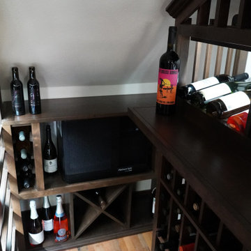 Wooden Wine Racks Placed Under Stairs