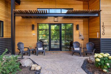 Inspiration for a rustic single front door remodel in Boise