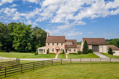 Example of a cottage exterior home design in Philadelphia